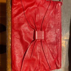 Red clutch bag